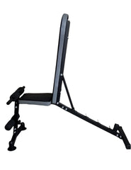 Black weight bench on a gray floor with a wooden wall background