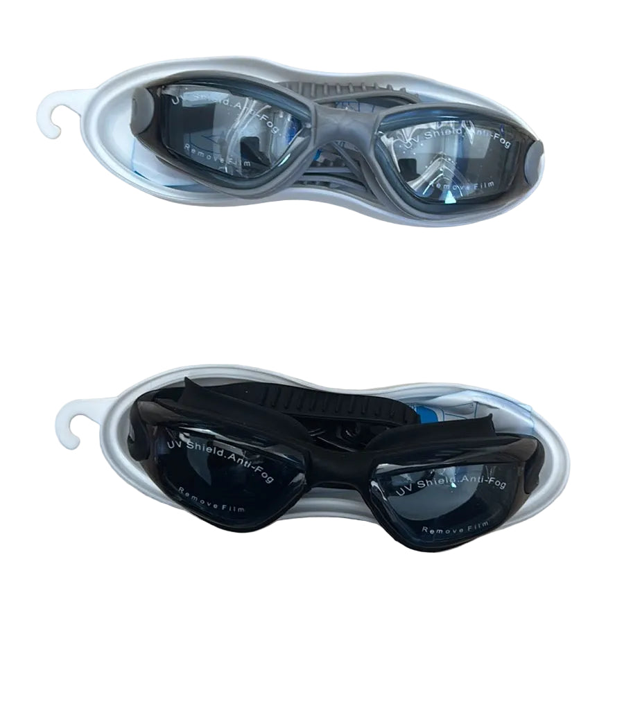 Two pairs of swim goggles resting on a beige stone surface, one in a white case and one in a gray case. The top pair has a gray frame and dark lenses, and the bottom pair has a black frame and dark lenses.